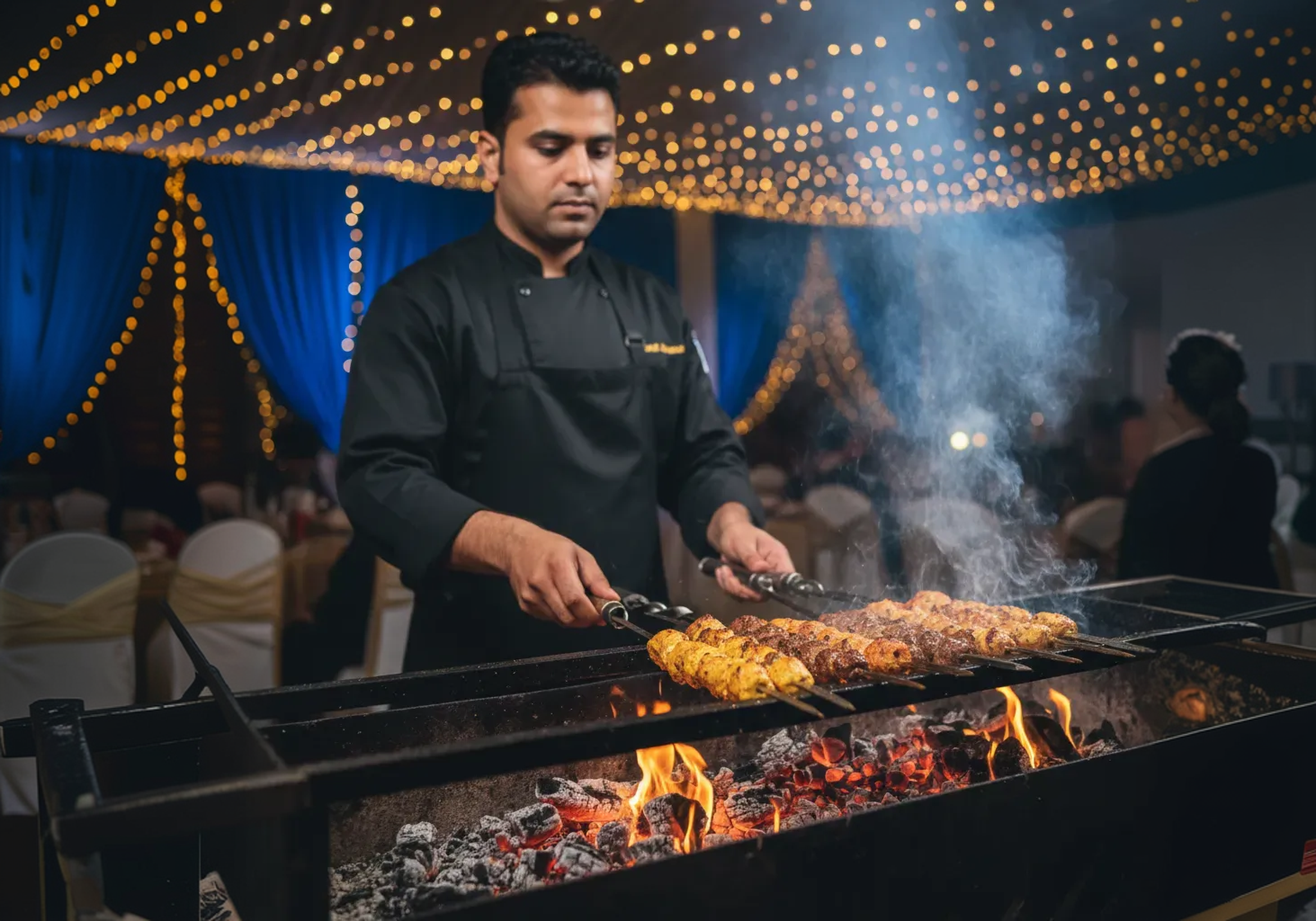 Image showing an expert BBQ chef cooking tender meat on coal fire